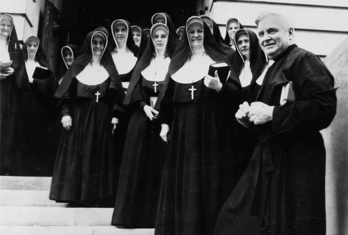 Daniel Lord, S.J. with Catholic sisters